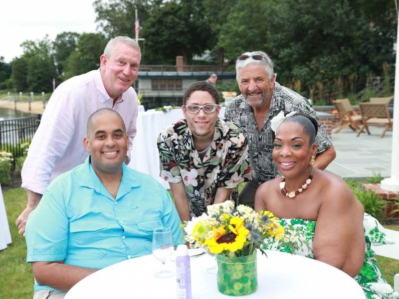 Jonathan Cotto and mother Selina Cotto (seated), Steve Frankel, James Hetem & Stan Arno